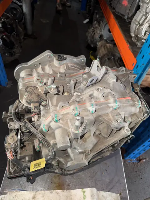 Used transmission on warehouse rack